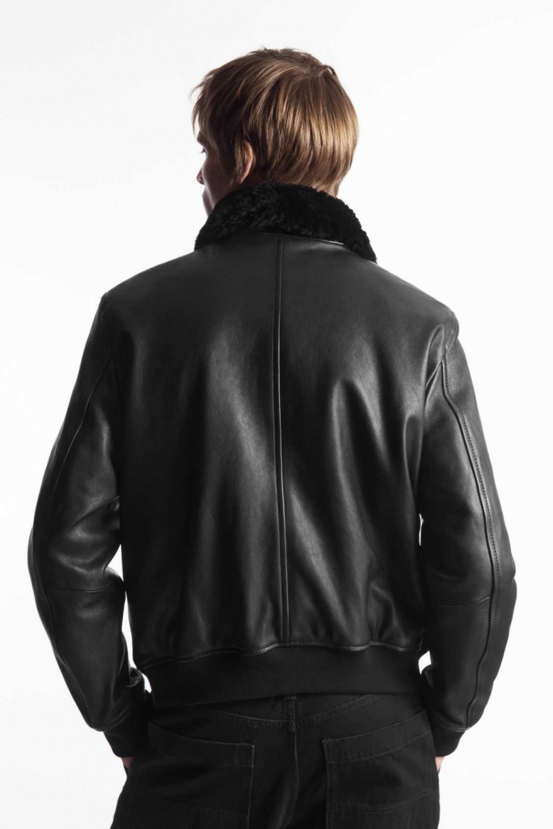 BLACK COS SHEARLING-TRIMMED LEATHER BOMBER JACKET | WCU-945386