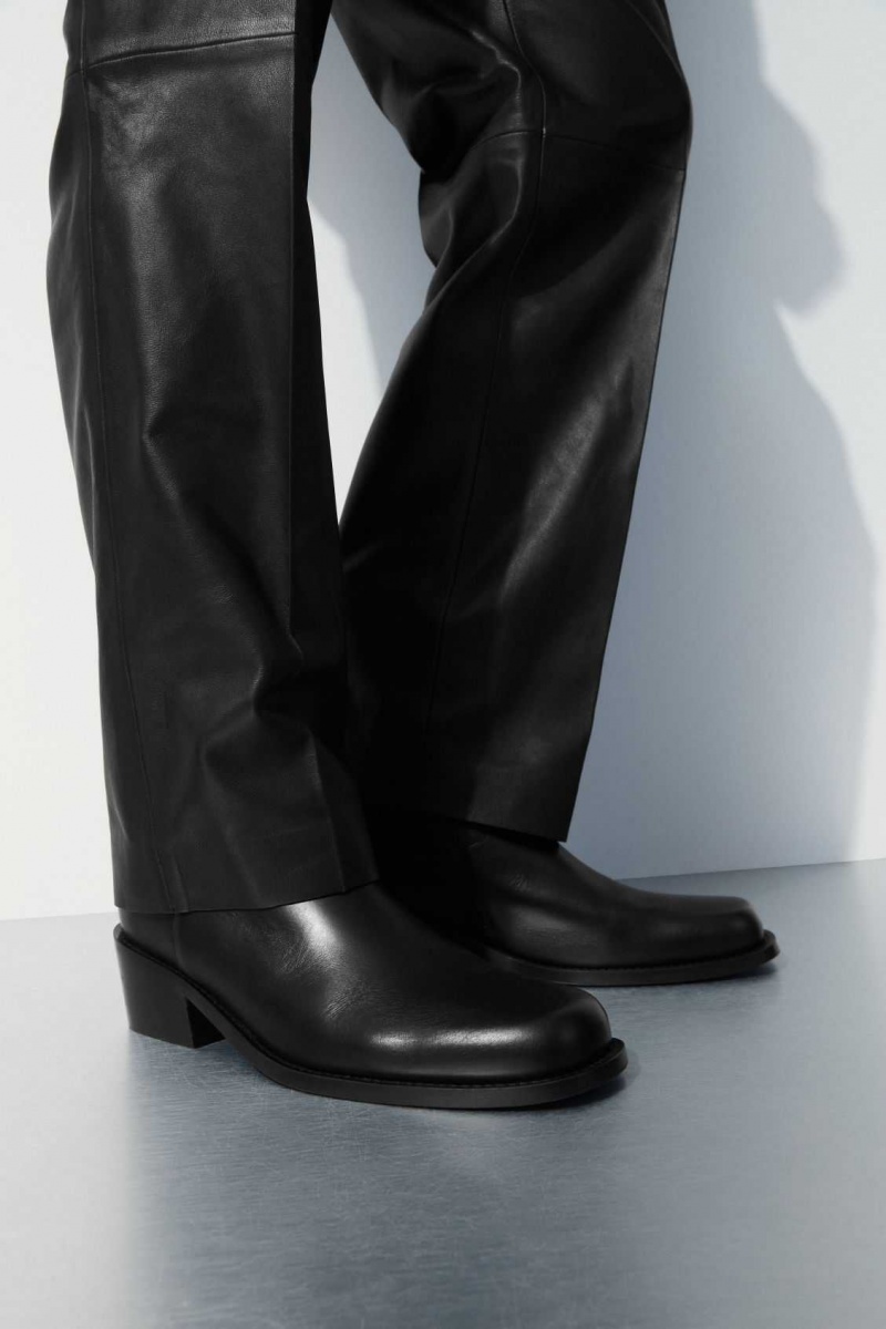 BLACK COS THE HEELED LEATHER BOOTS | GPM-204958